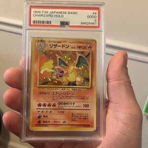 1996 Japanese Charizard Holo Graded PSA 2 Card - Iconic Pokémon
